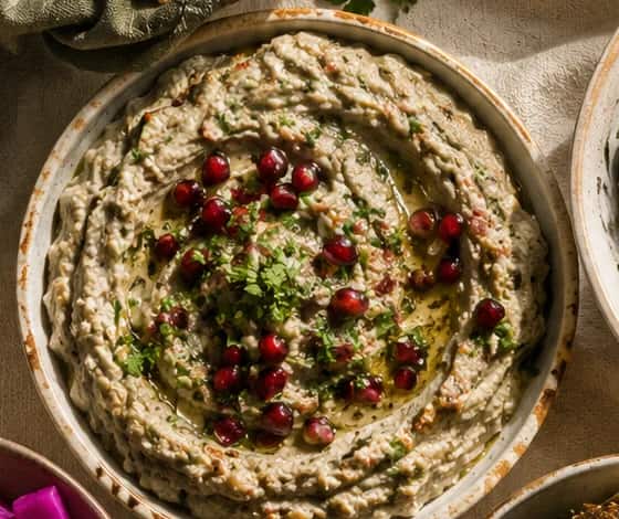 Smoky baba ghanoush swirled with olive oil